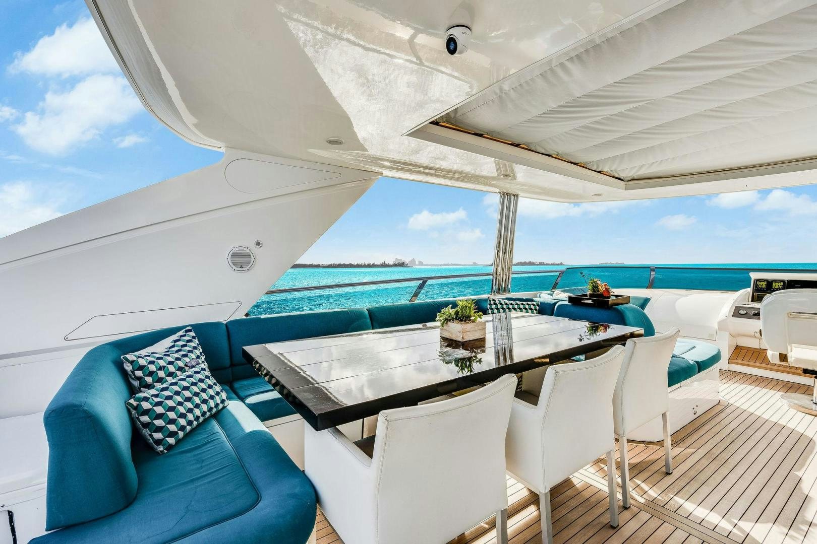 a large white tent with a table and chairs on it aboard 21 SEA SANDS Yacht for Sale