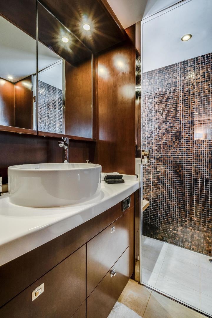 a bathroom with a sink and a shower aboard 21 SEA SANDS Yacht for Sale
