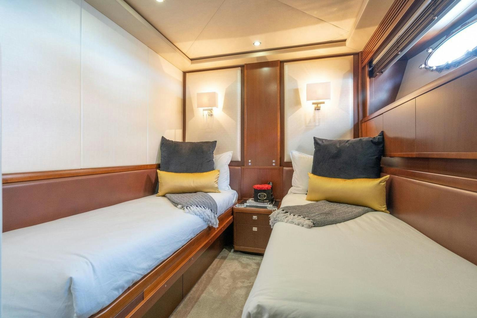 a couple of beds in a hotel room aboard 21 SEA SANDS Yacht for Sale