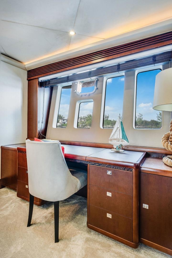 a room with a desk and a chair aboard 21 SEA SANDS Yacht for Sale