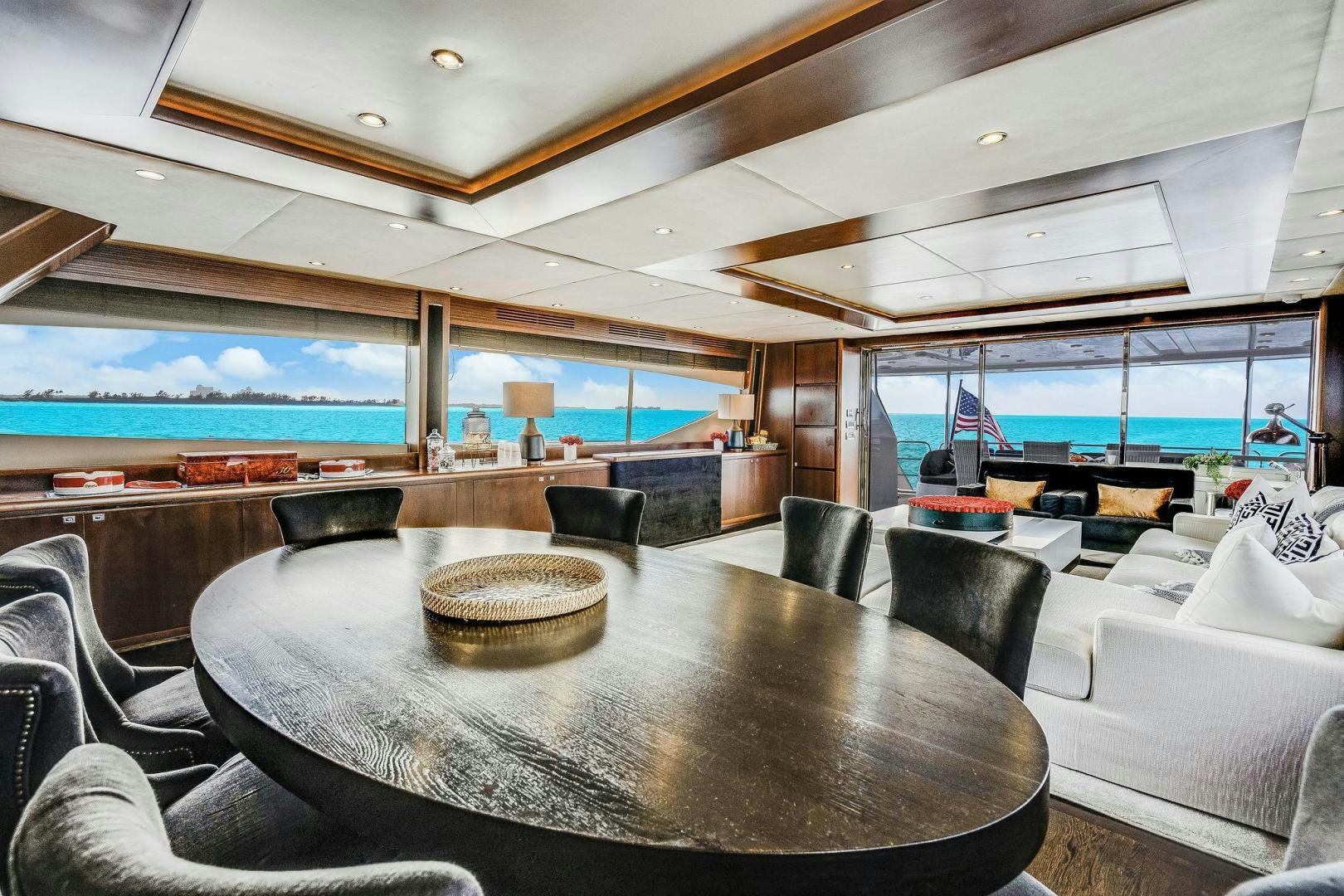 a room with a table and chairs aboard 21 SEA SANDS Yacht for Sale