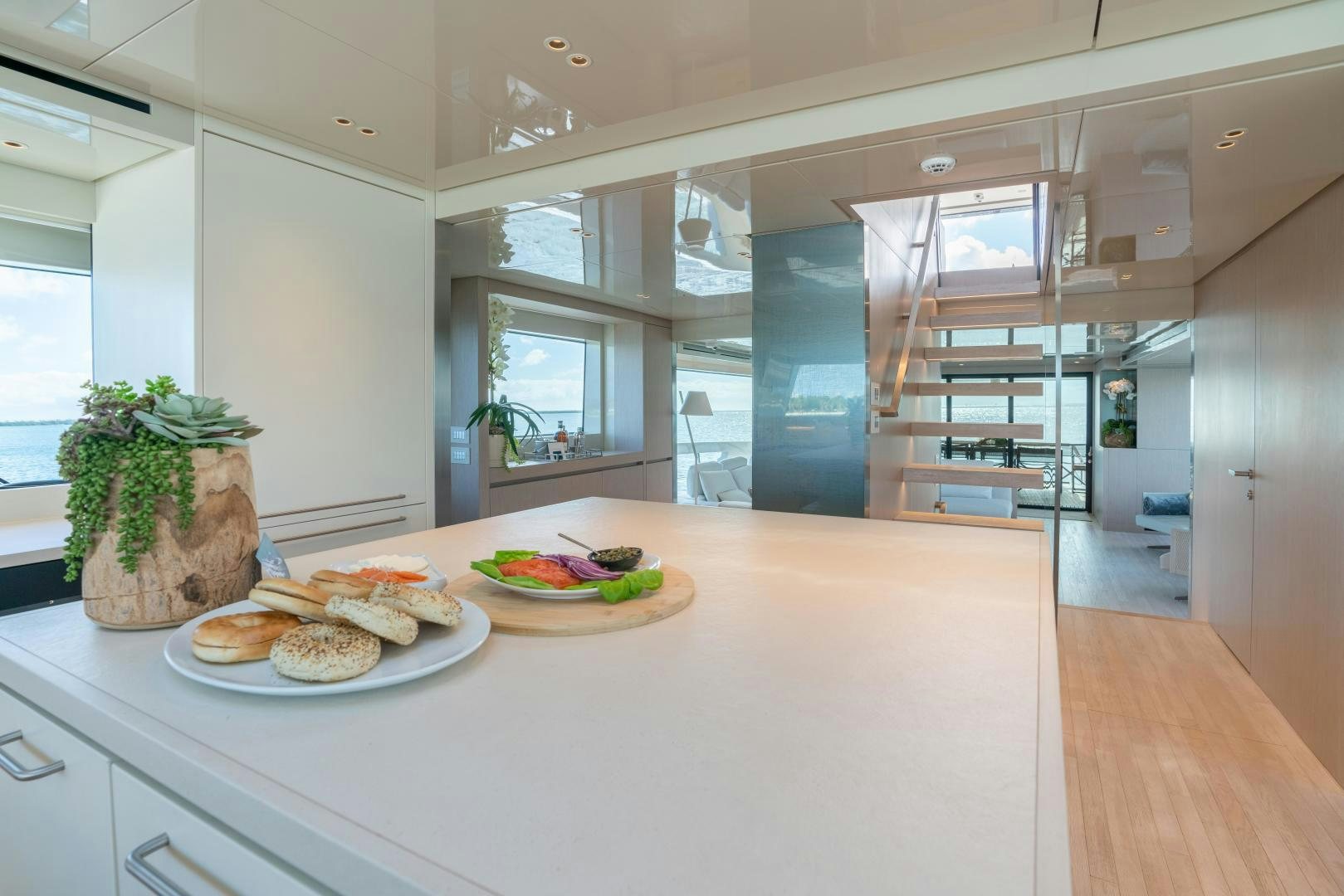 a kitchen with plates of food aboard MAVE Yacht for Sale