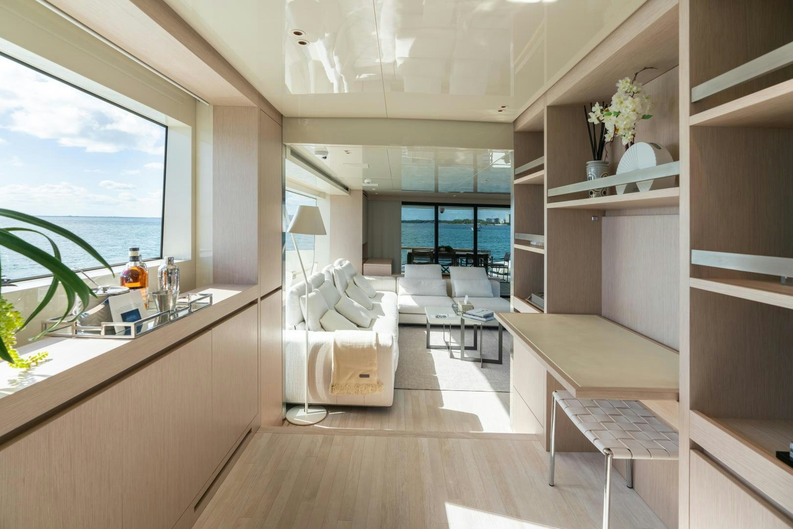 a room with a bed and a table aboard MAVE Yacht for Sale
