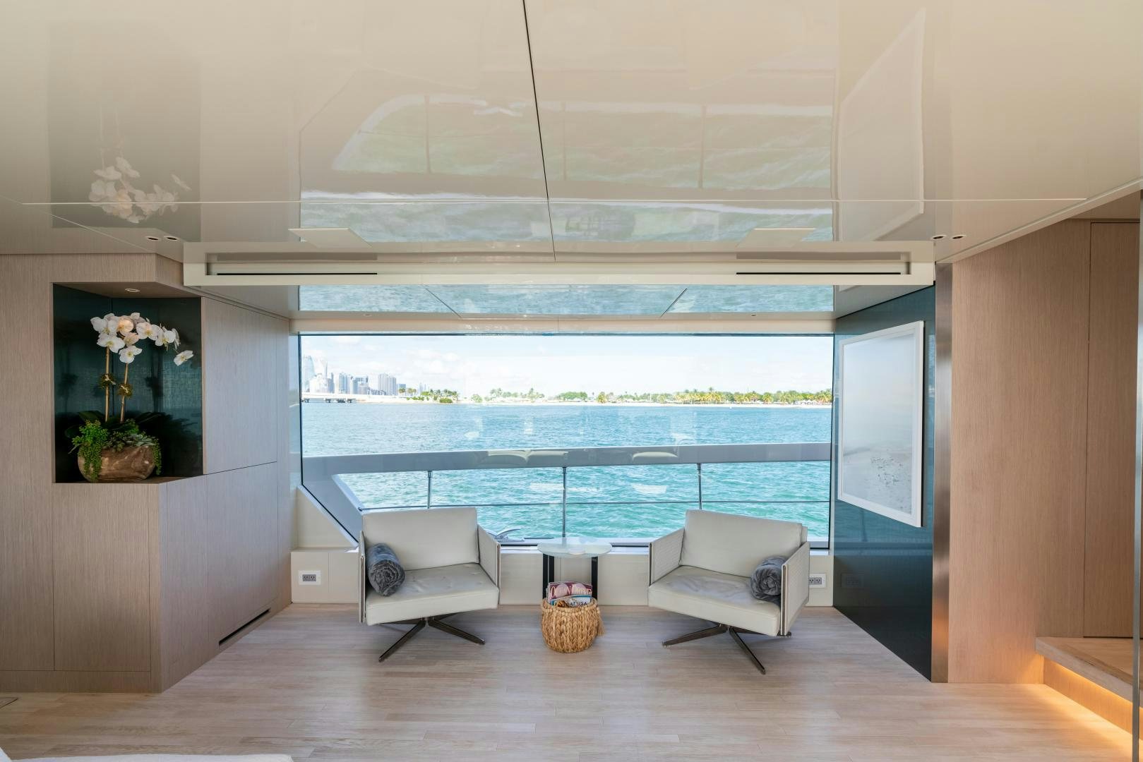 a room with a view of the ocean and a large window aboard MAVE Yacht for Sale