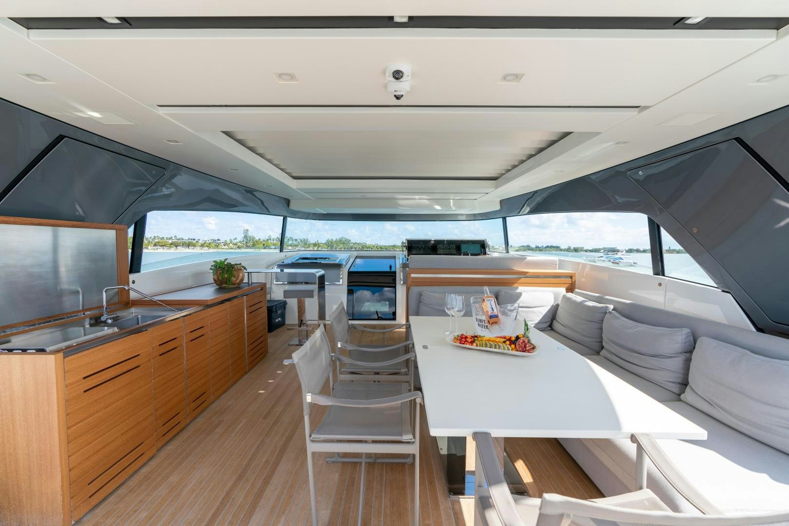a room with a table and chairs aboard MAVE Yacht for Sale