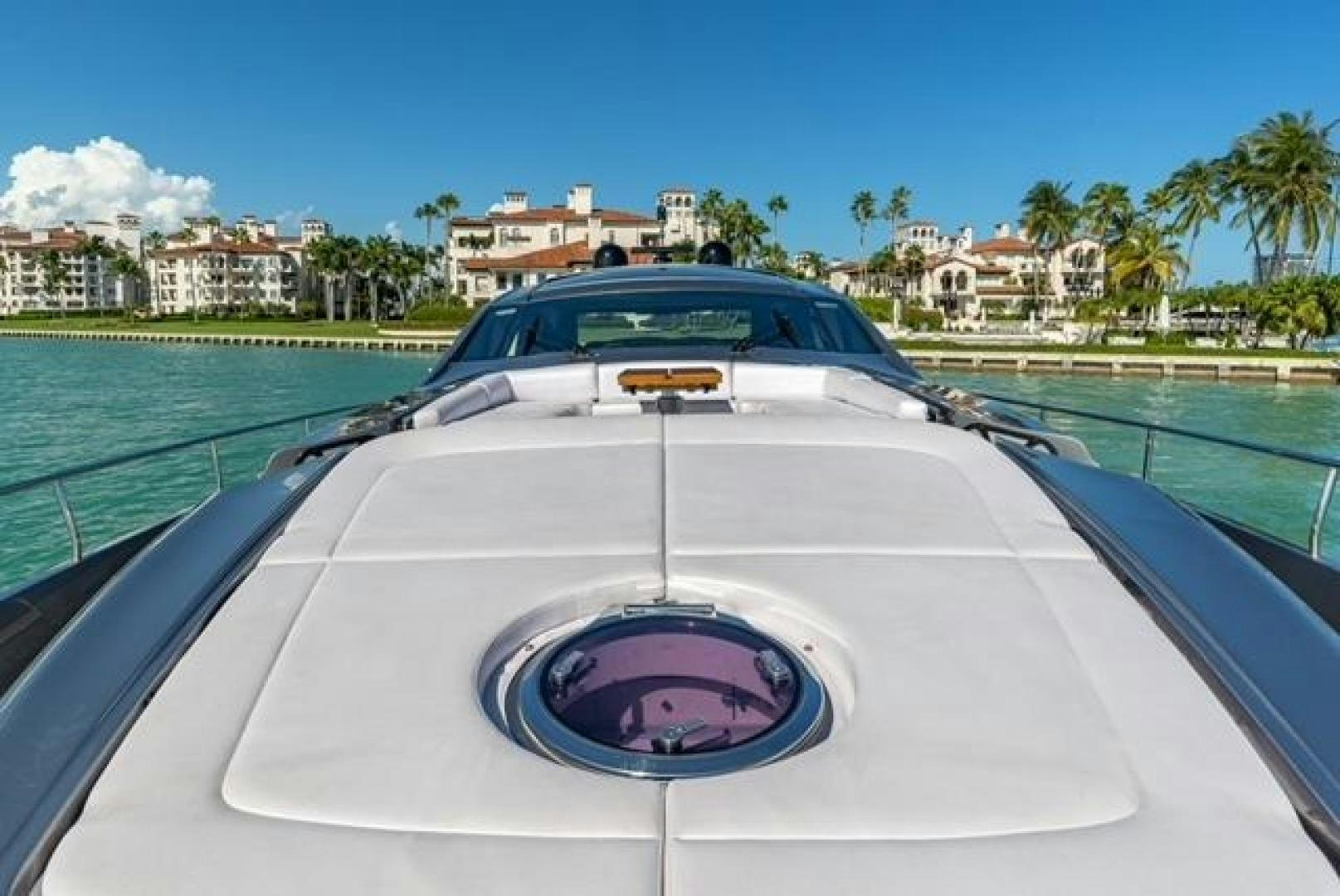 a car driving on a road aboard RAW 2 Yacht for Sale