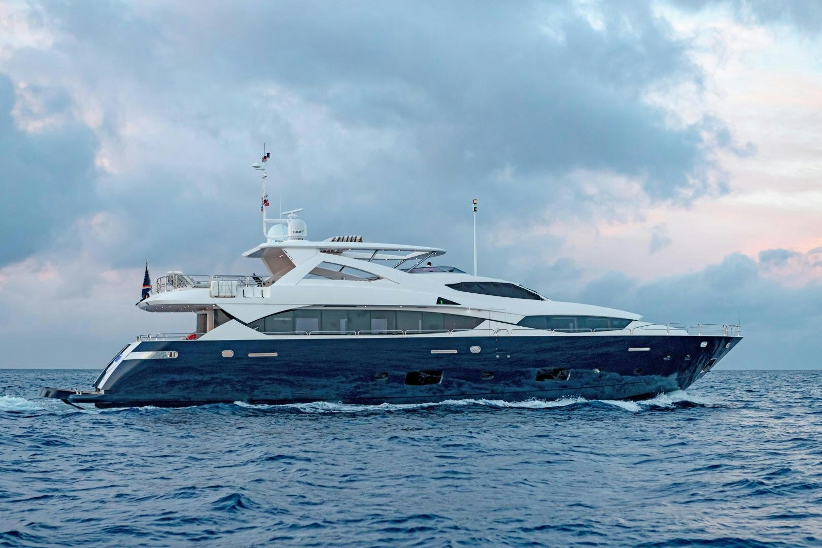 a large boat in the water aboard CORAZON Yacht for Sale