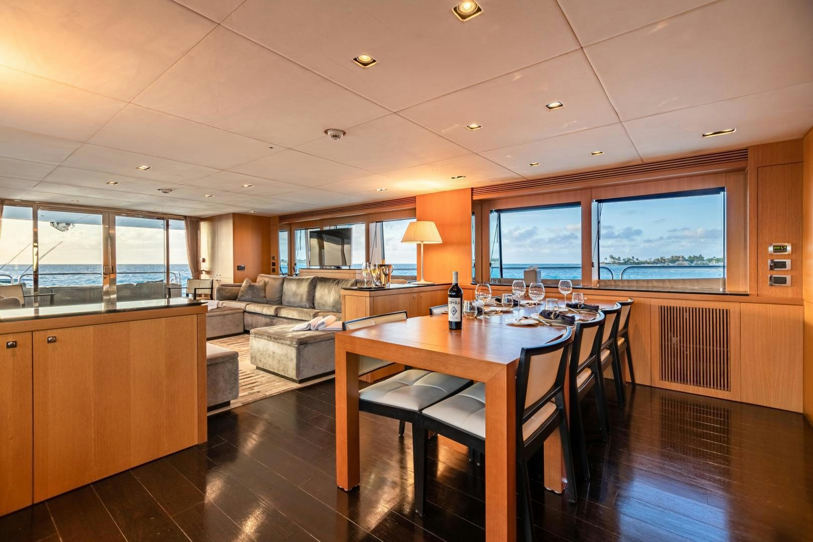 a large kitchen and dining area aboard CORAZON Yacht for Sale