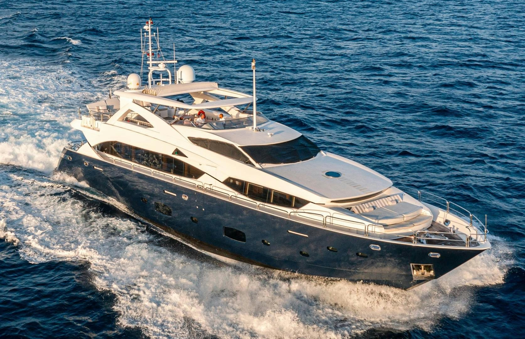 a large white ship in the water aboard CORAZON Yacht for Sale