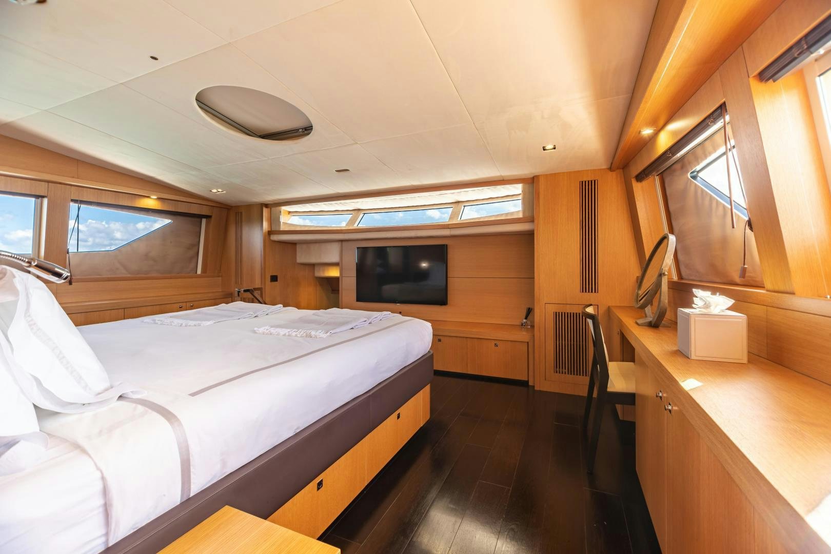 a room with two beds aboard CORAZON Yacht for Sale