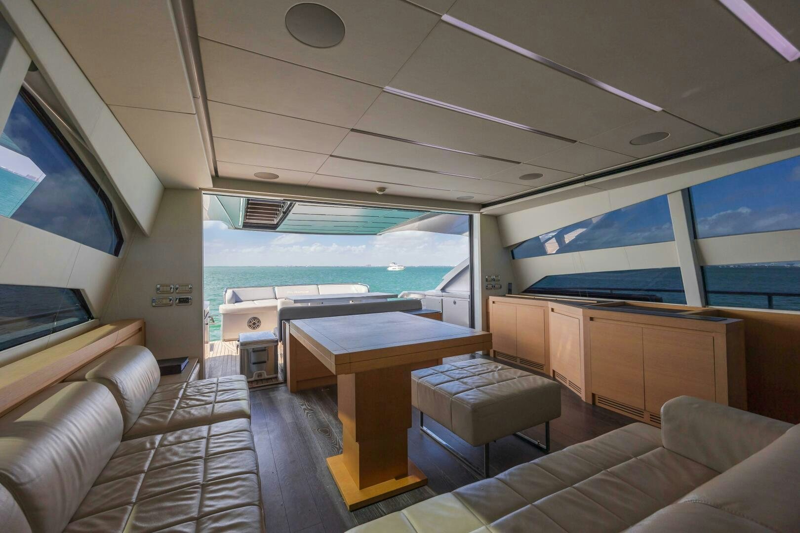 a room with a boat and a desk aboard MILAGROS Yacht for Sale