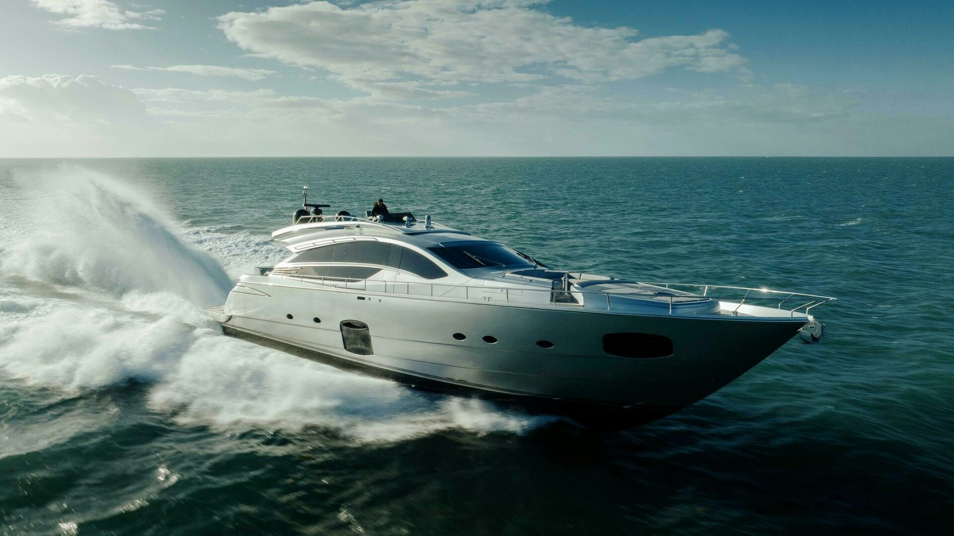 a white yacht on the water aboard MILAGROS Yacht for Sale