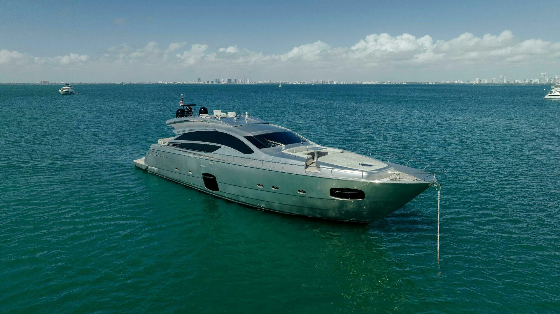 a white yacht in the water aboard MILAGROS Yacht for Sale