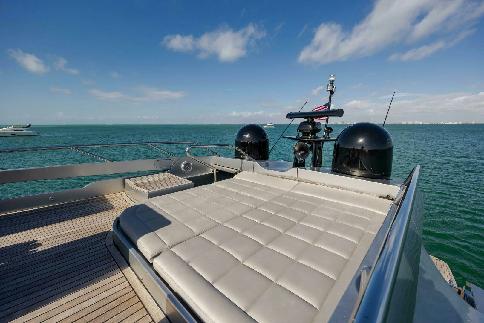 a boat with a satellite dish on the deck aboard MILAGROS Yacht for Sale
