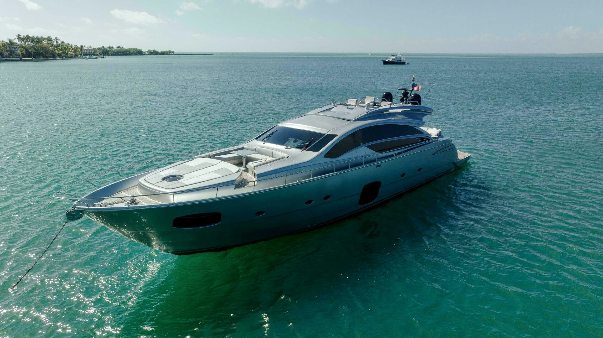 a white yacht in the water aboard MILAGROS Yacht for Sale