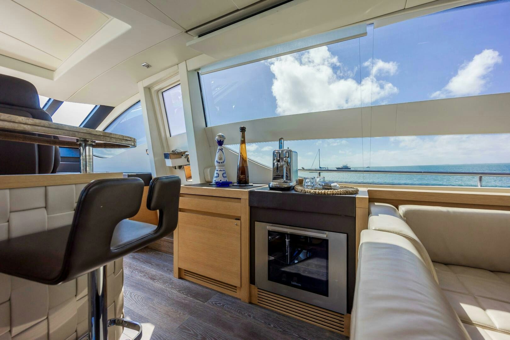 a room with a fireplace and a television aboard MILAGROS Yacht for Sale