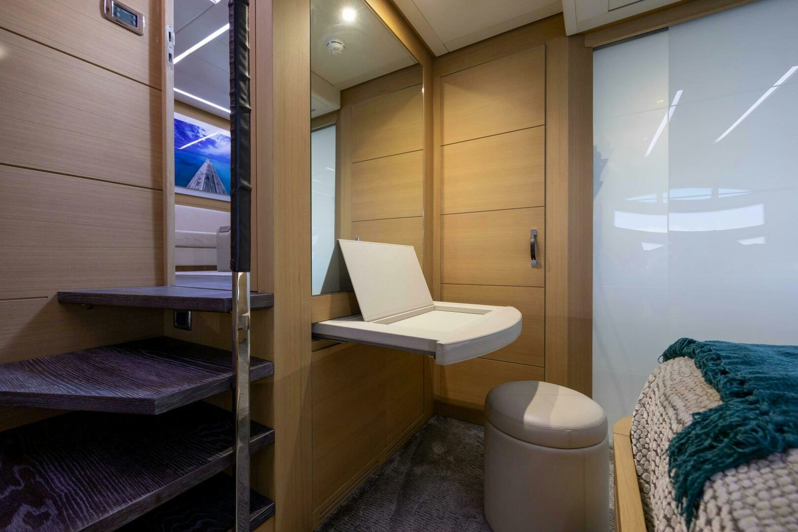 a room with a bed and a desk aboard MILAGROS Yacht for Sale