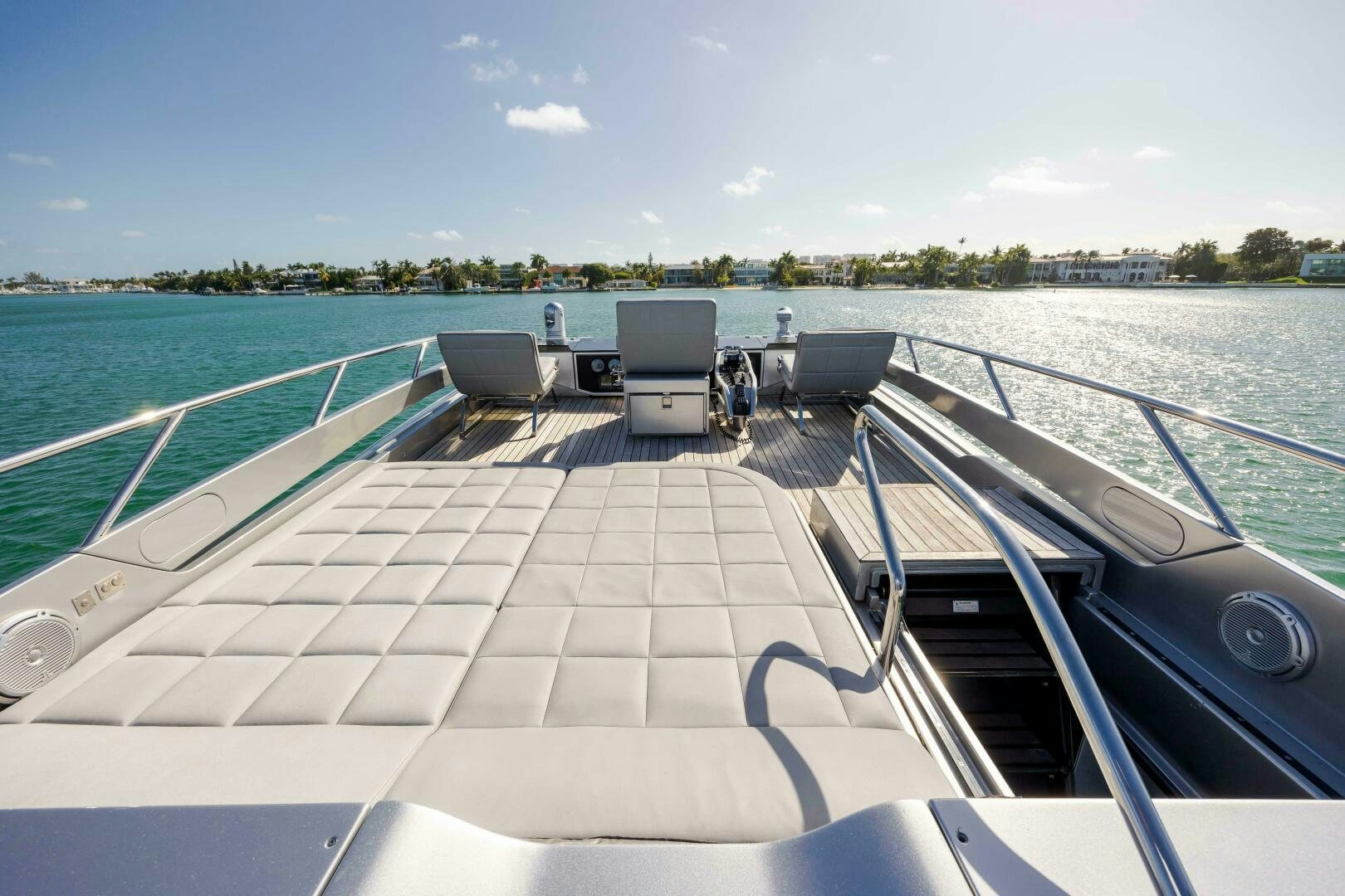 a deck with chairs on it aboard MILAGROS Yacht for Sale