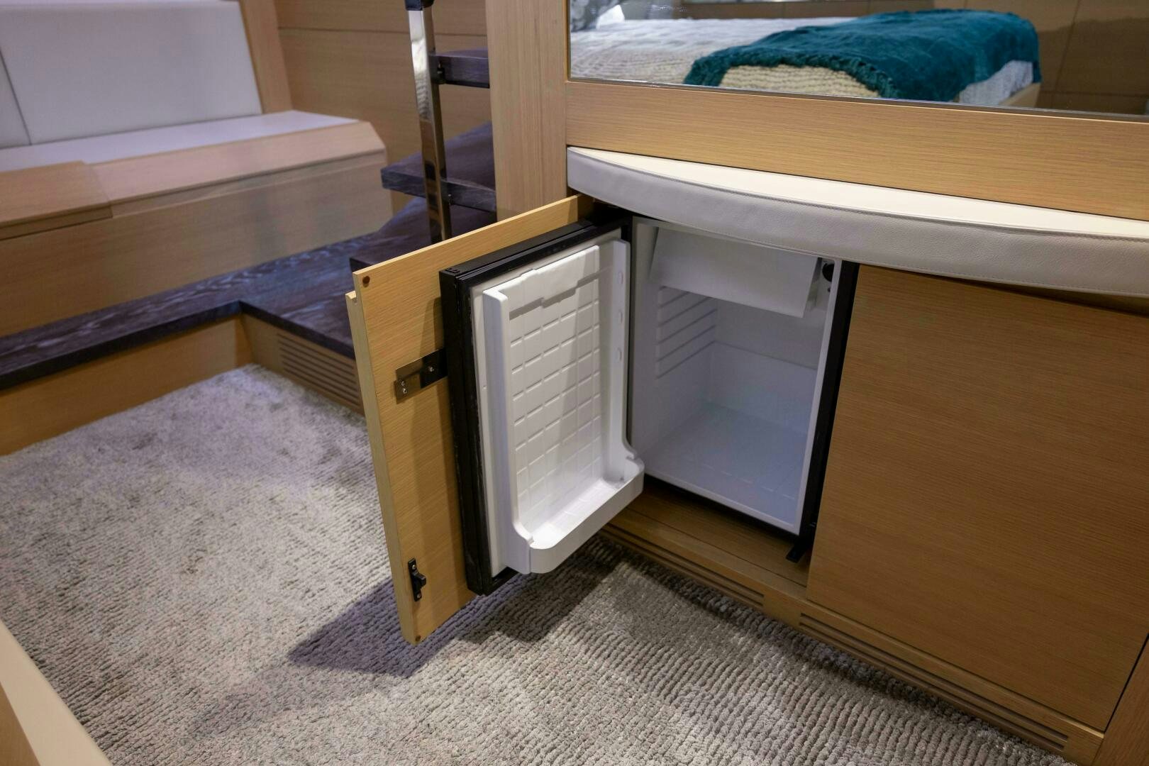 a cabinet in a room aboard MILAGROS Yacht for Sale