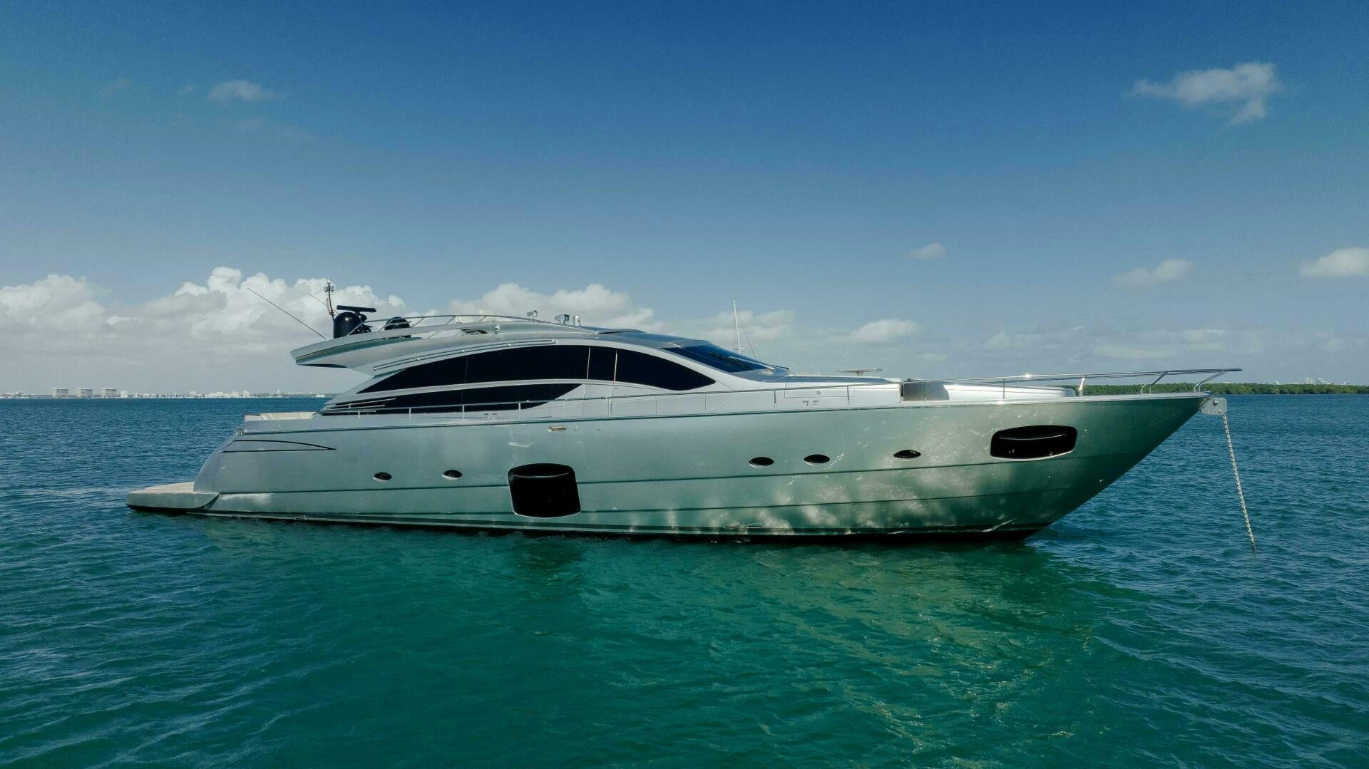 a white yacht in the water aboard MILAGROS Yacht for Sale