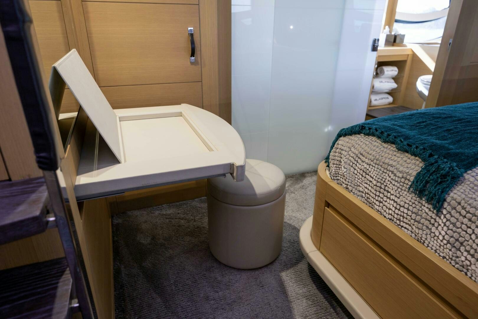 a white table with a blue cloth on it aboard MILAGROS Yacht for Sale