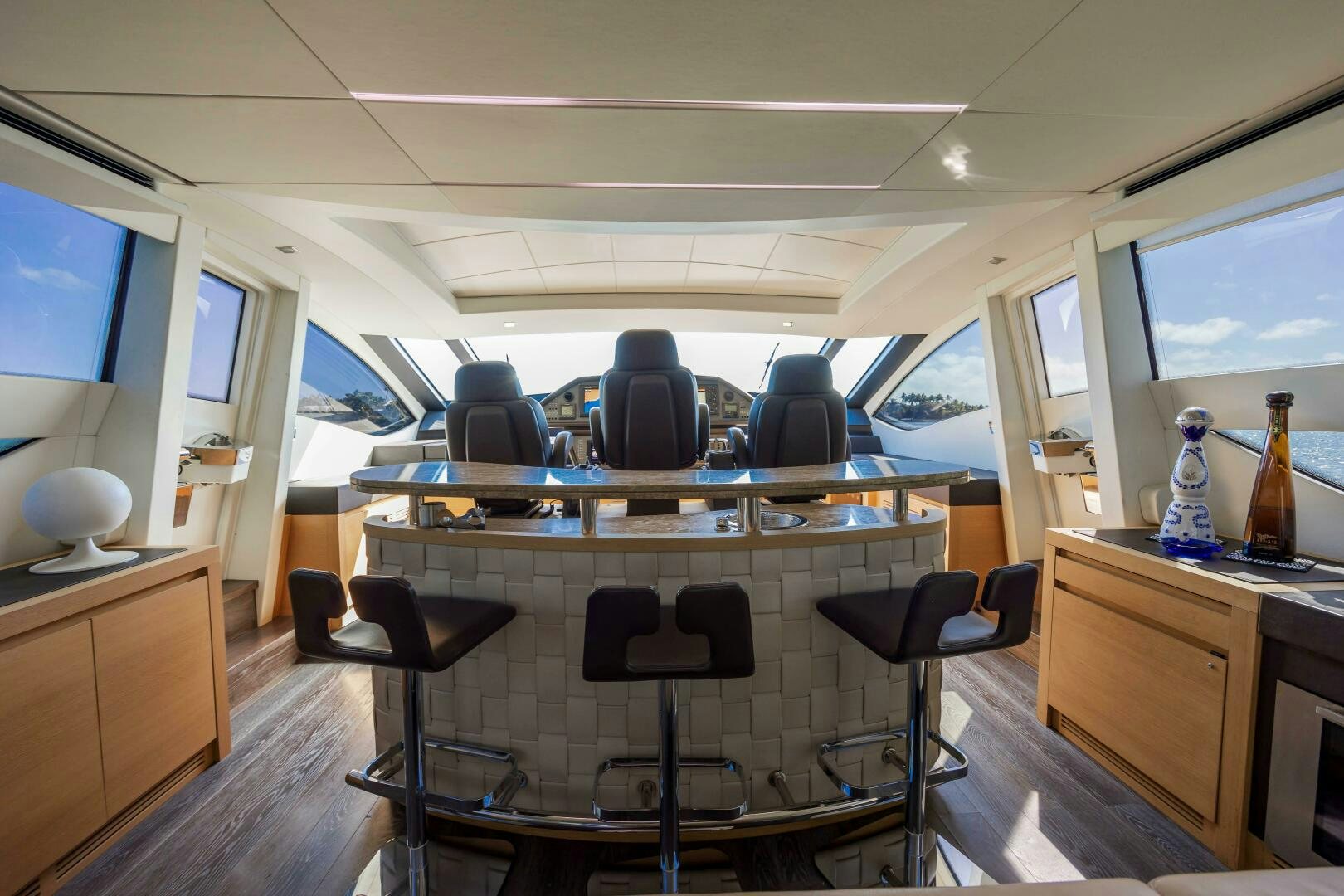 a room with a table and chairs aboard MILAGROS Yacht for Sale