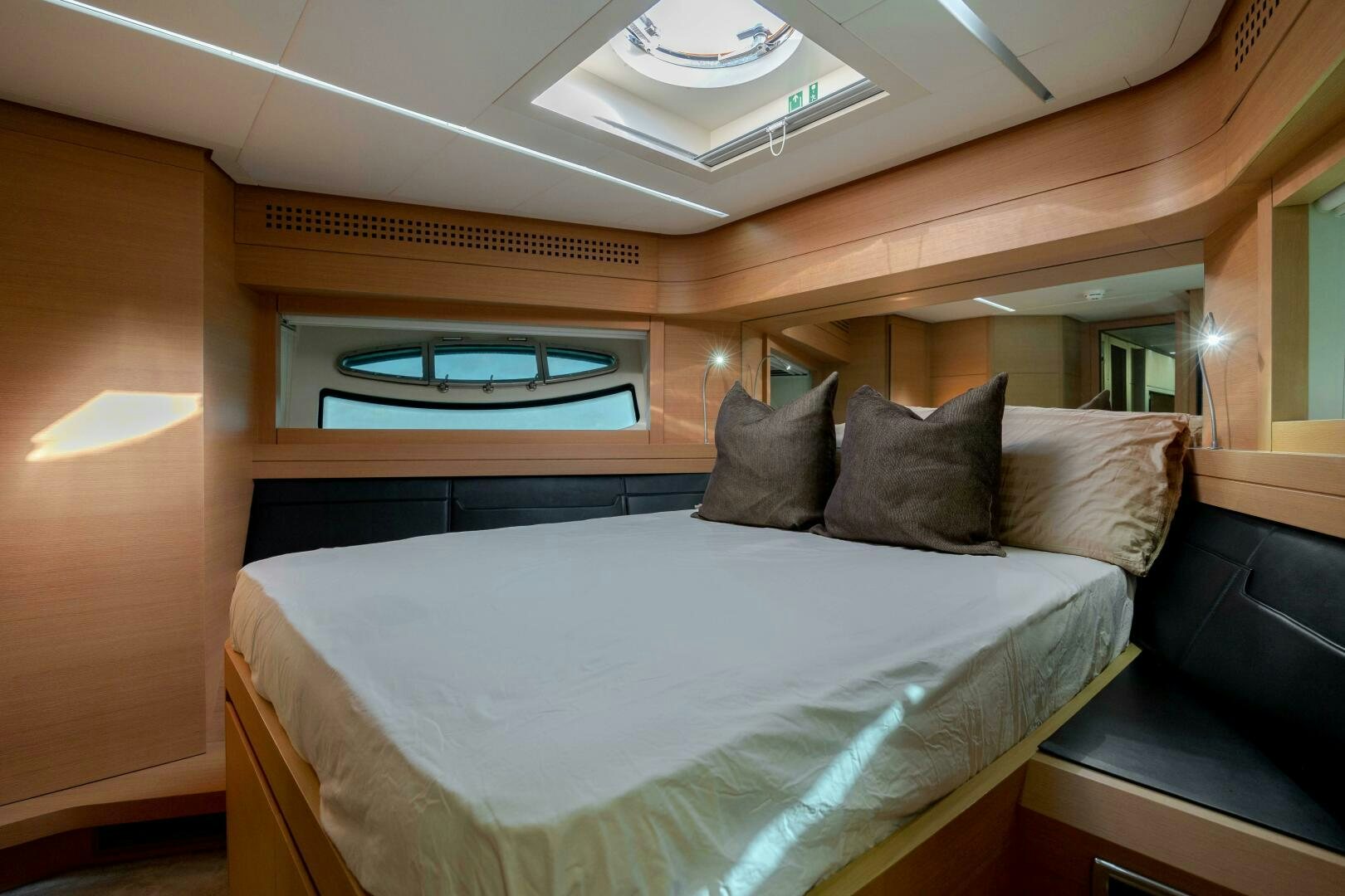 a bed in a room aboard MILAGROS Yacht for Sale