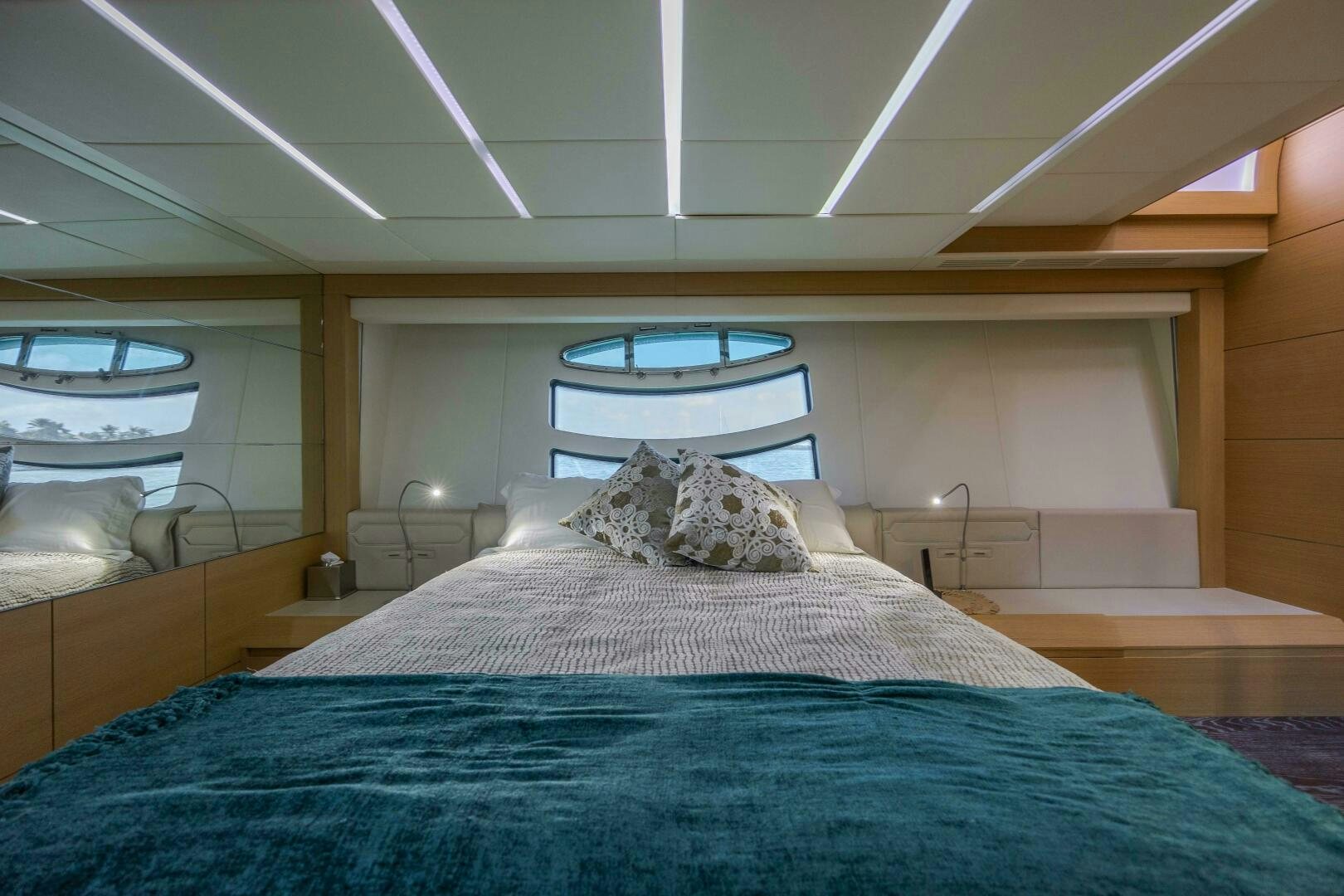 a bedroom with a large bed aboard MILAGROS Yacht for Sale