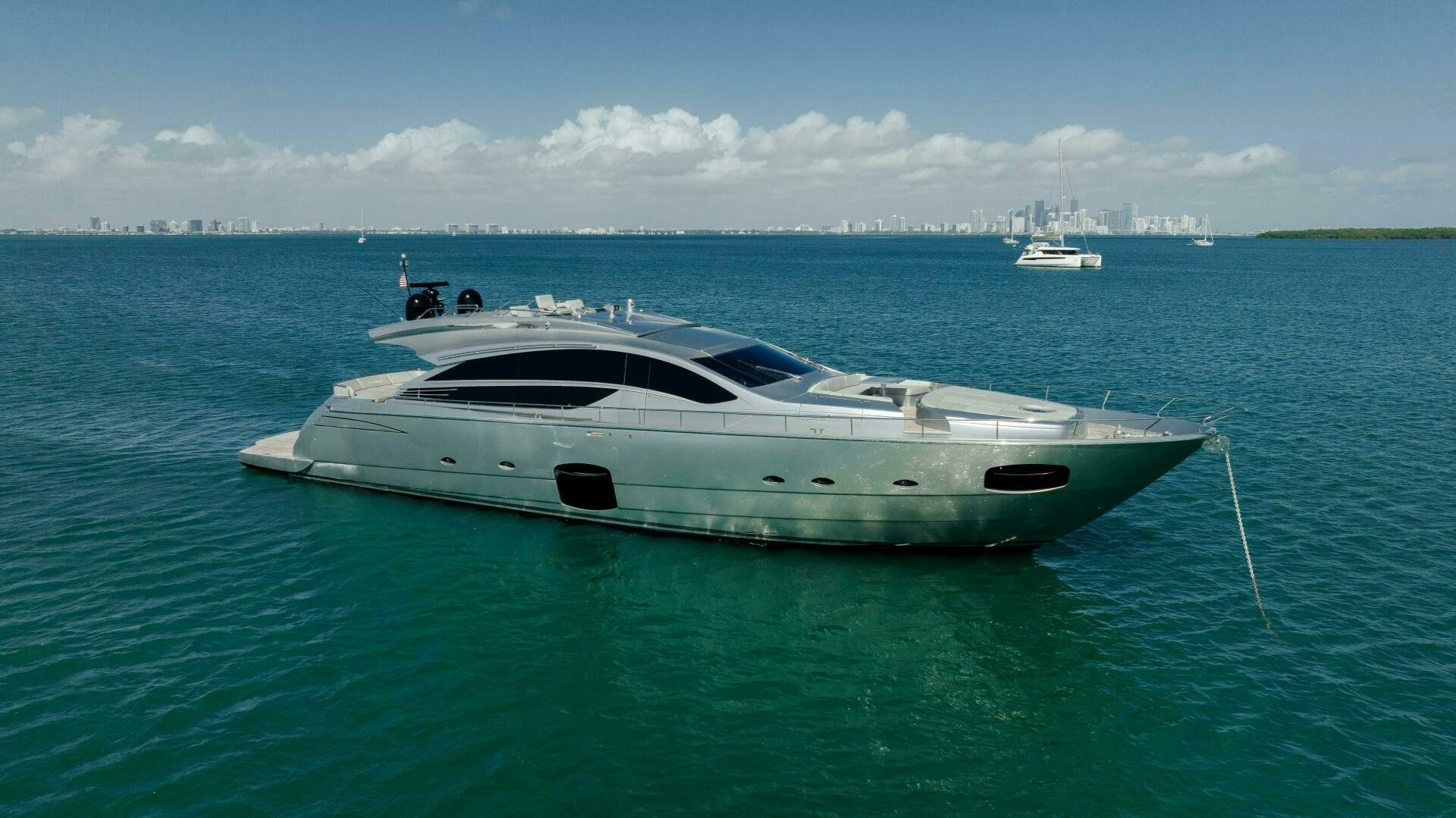 a white boat in the water aboard MILAGROS Yacht for Sale