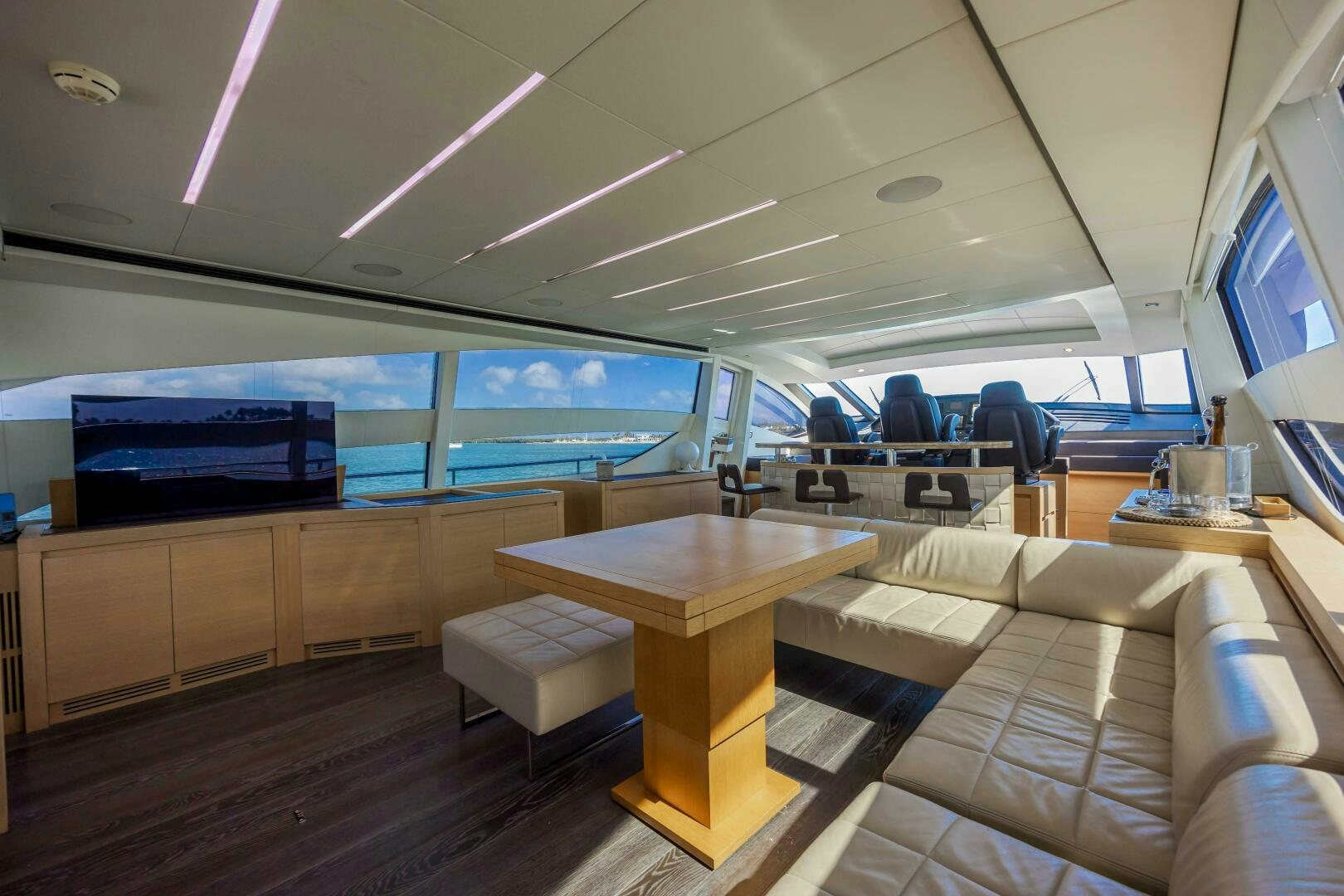 a room with a couch and a table aboard MILAGROS Yacht for Sale