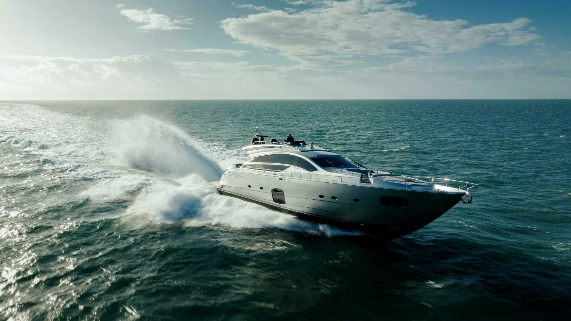 a white yacht in the water aboard MILAGROS Yacht for Sale