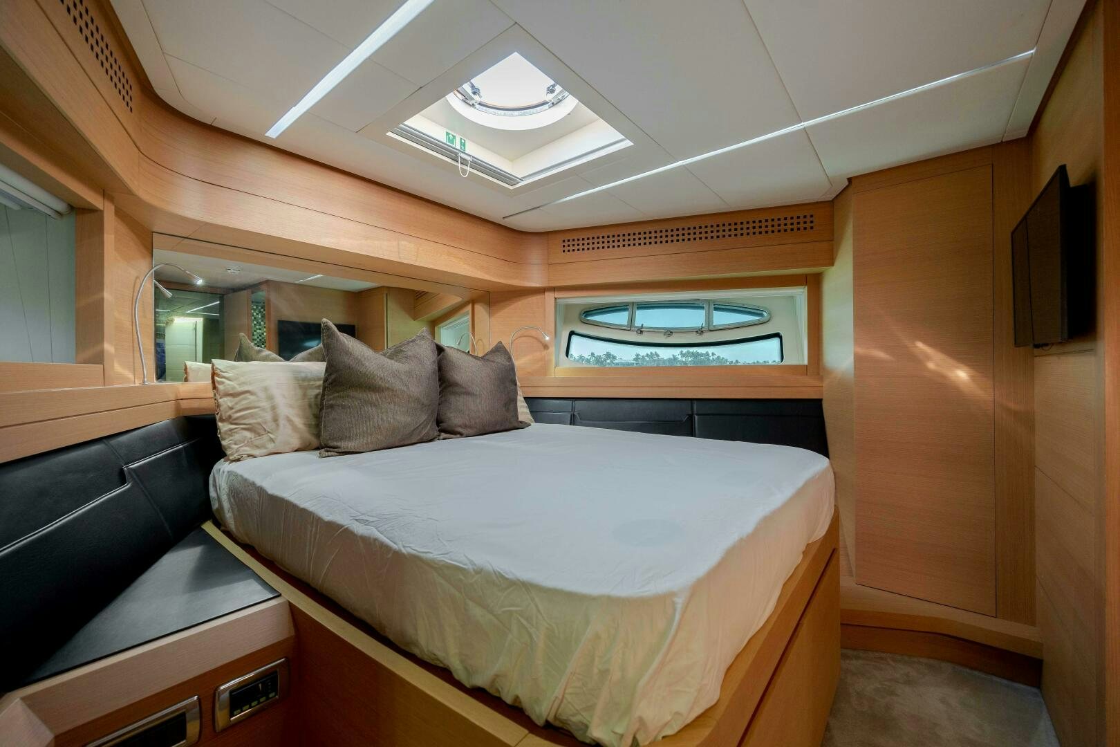 a bed in a room aboard MILAGROS Yacht for Sale