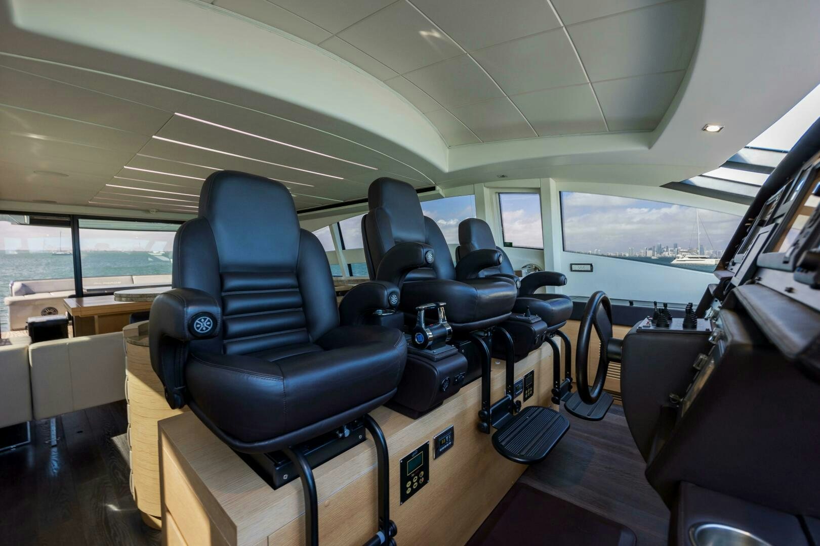inside of a vehicle with seats and a view of the outside aboard MILAGROS Yacht for Sale