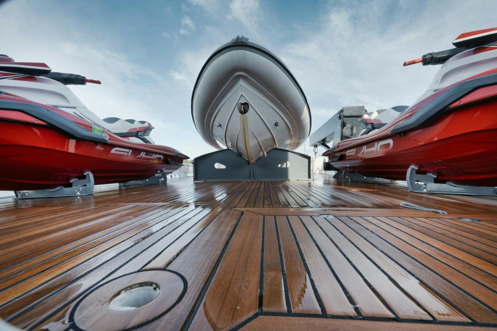a large satellite dish on a wooden deck aboard NANAN SHADOW Yacht for Sale