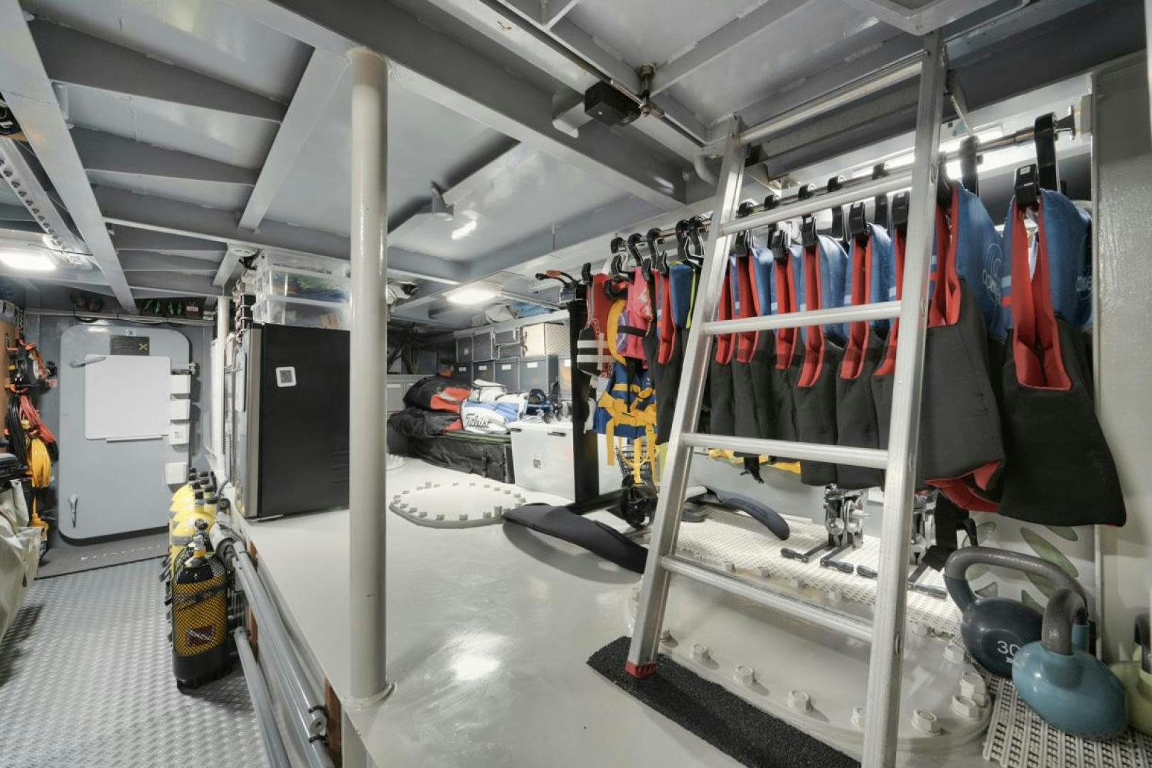 a large room with several equipment aboard NANAN SHADOW Yacht for Sale