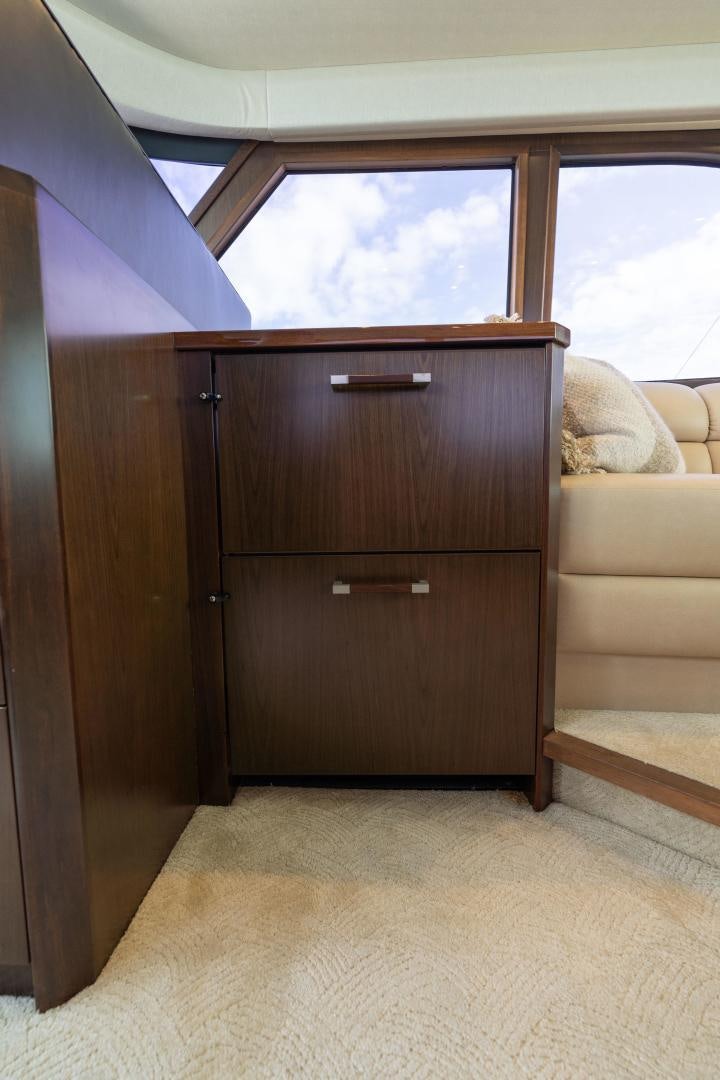 a wooden cabinet in a room aboard MER SEA SAKES Yacht for Sale