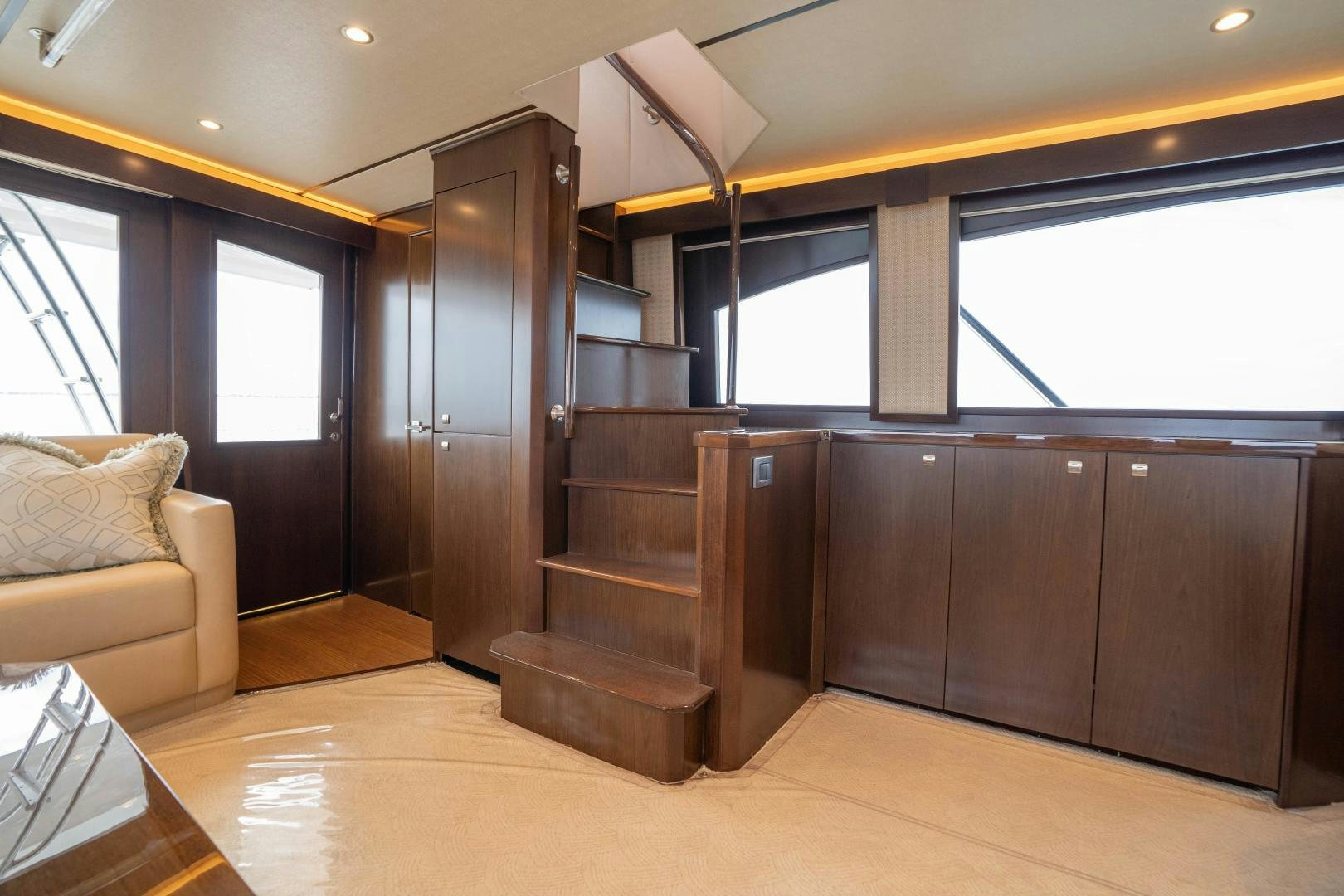a room with wooden furniture aboard MER SEA SAKES Yacht for Sale