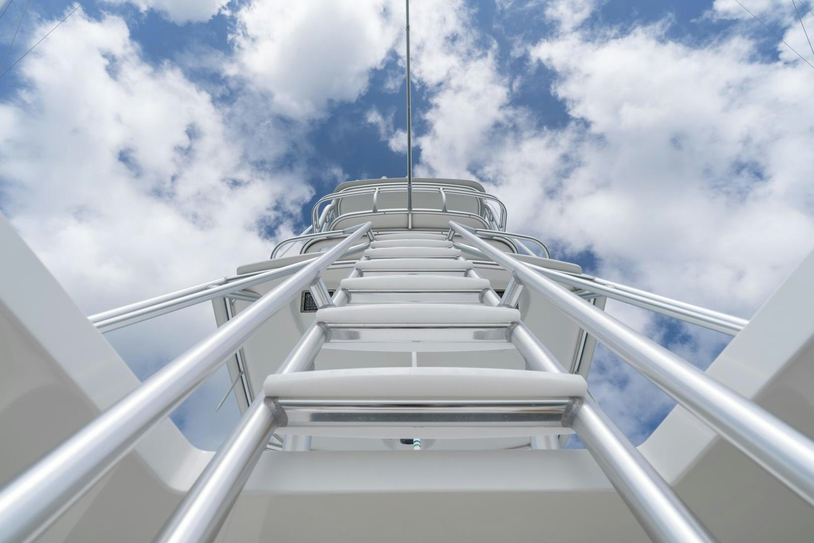 a white staircase with a railing aboard MER SEA SAKES Yacht for Sale