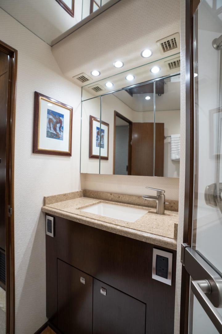 a bathroom with a large mirror aboard MER SEA SAKES Yacht for Sale