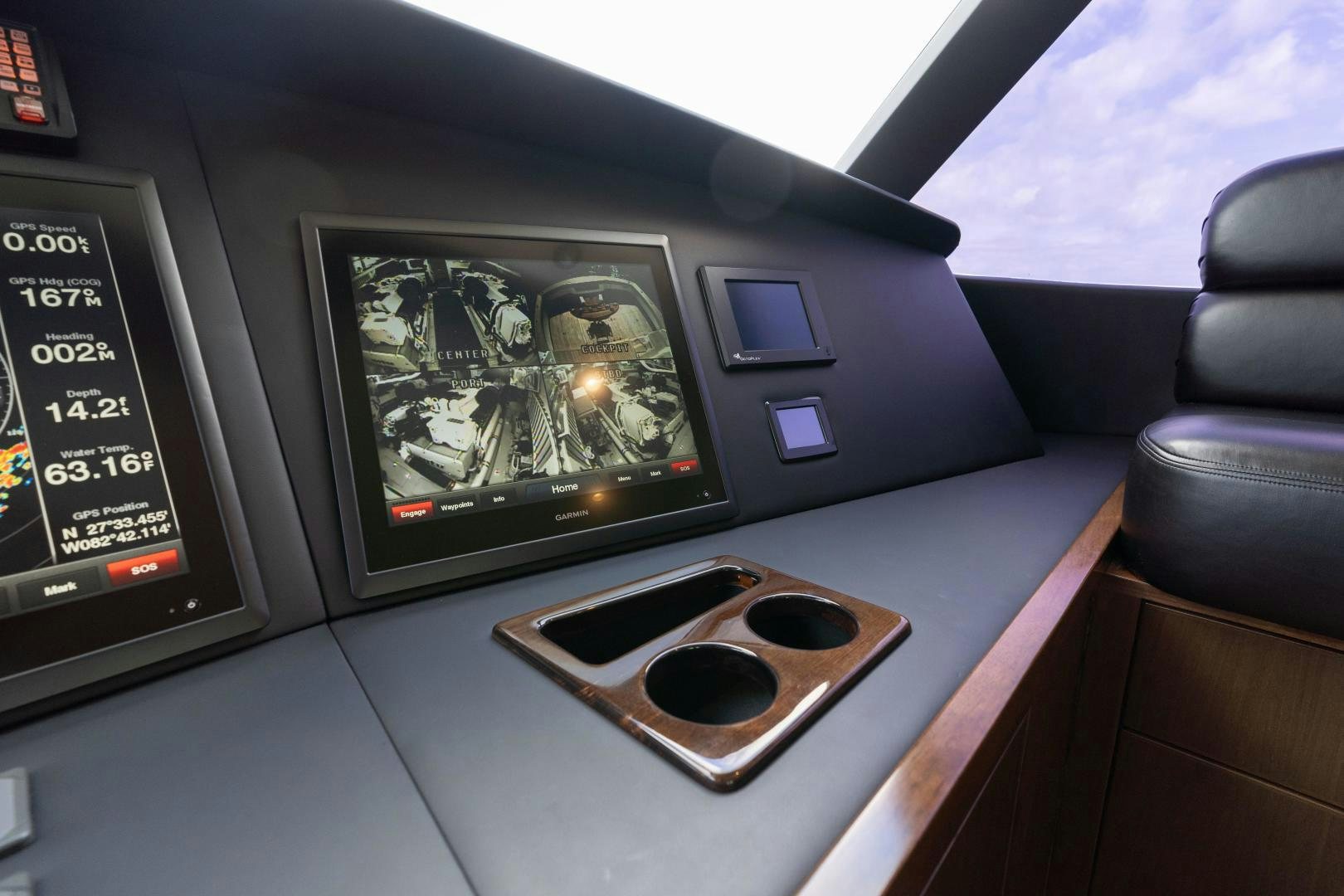 a console with a game console and a game controller aboard MER SEA SAKES Yacht for Sale
