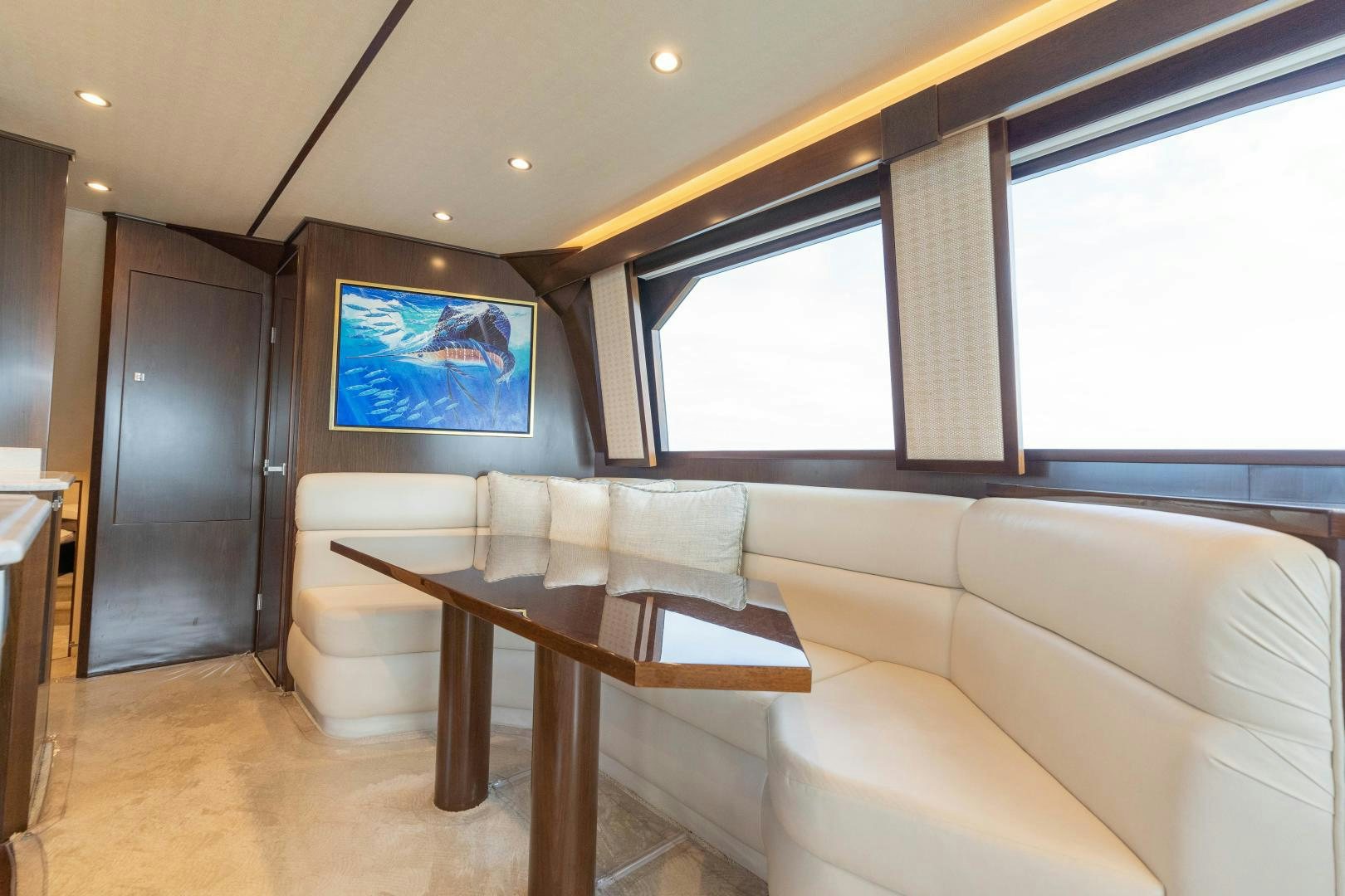 a living room with a couch and a tv aboard MER SEA SAKES Yacht for Sale