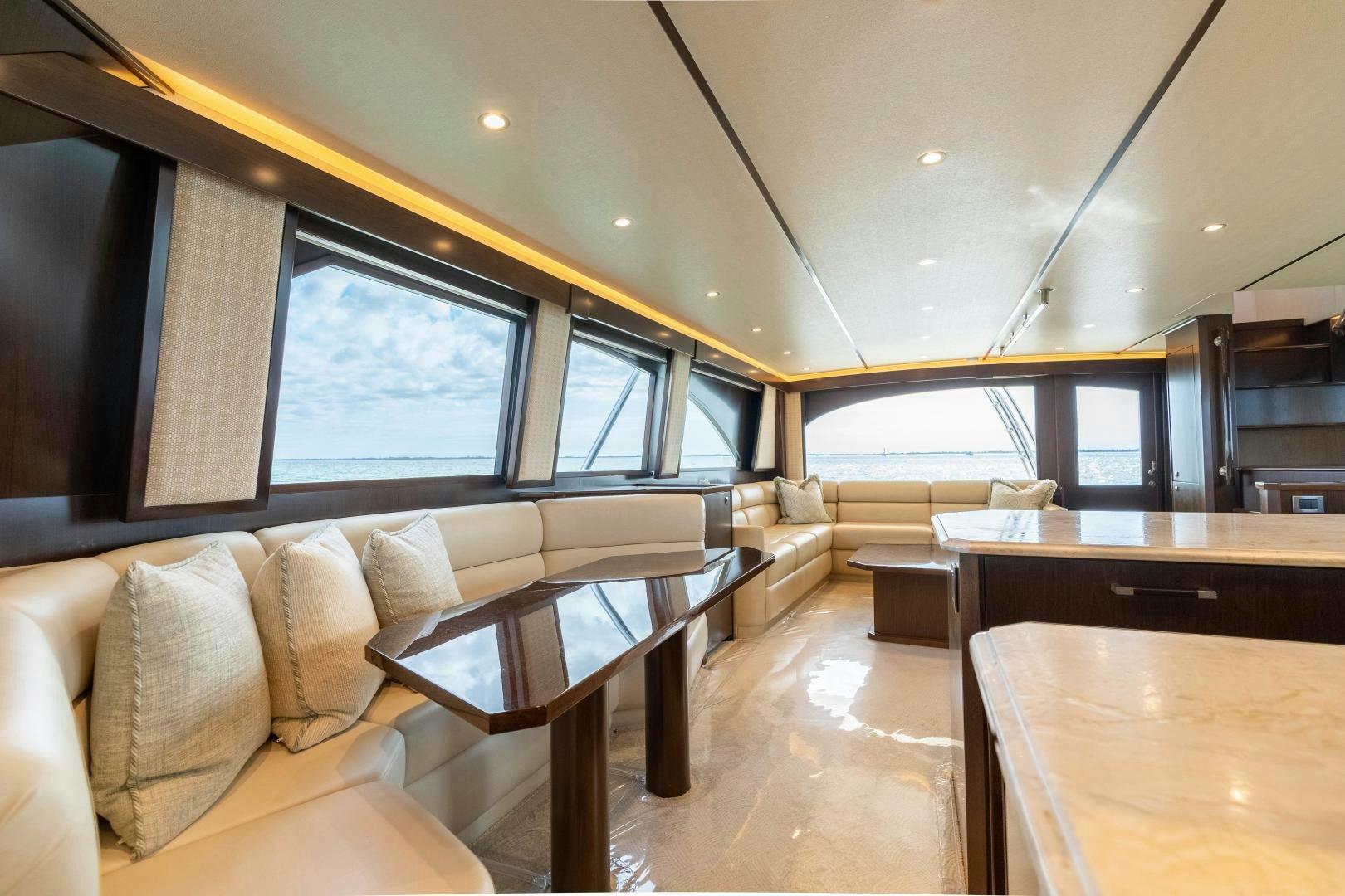 a room with a couch and a table and chairs aboard MER SEA SAKES Yacht for Sale