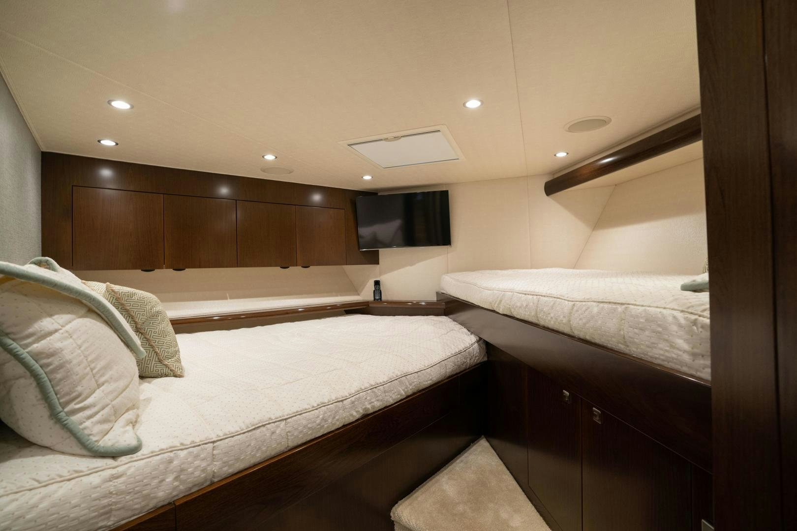 a room with a bed and a television aboard MER SEA SAKES Yacht for Sale
