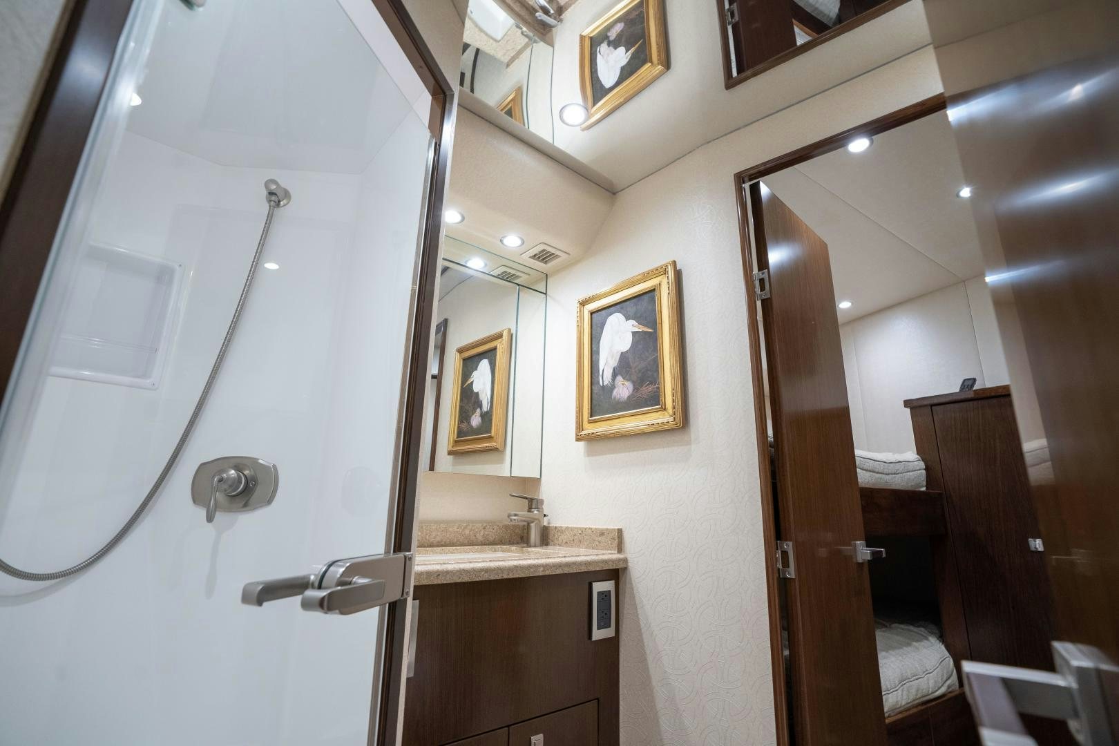 a bathroom with a shower and sink aboard MER SEA SAKES Yacht for Sale