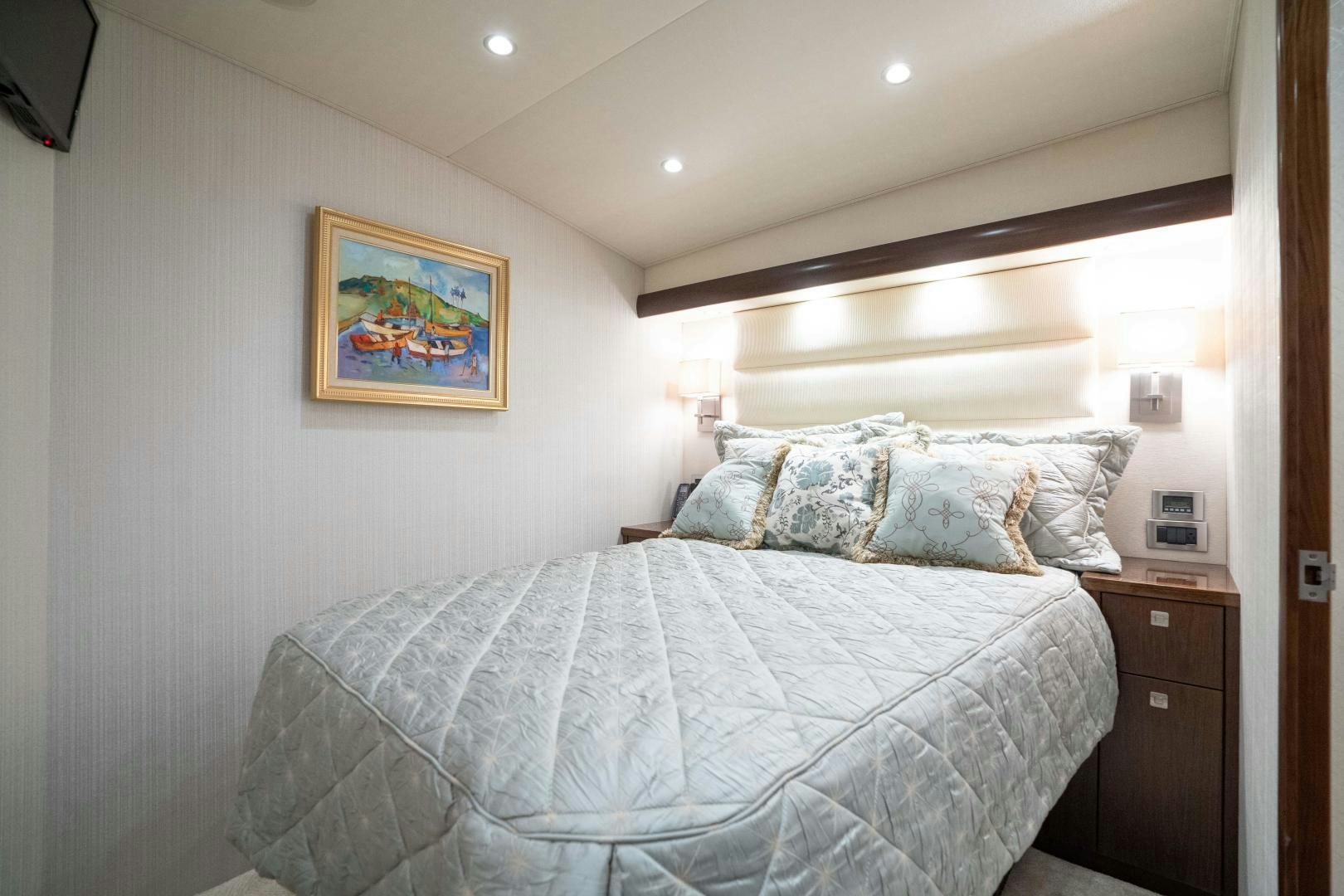 a bed with a white sheet aboard MER SEA SAKES Yacht for Sale