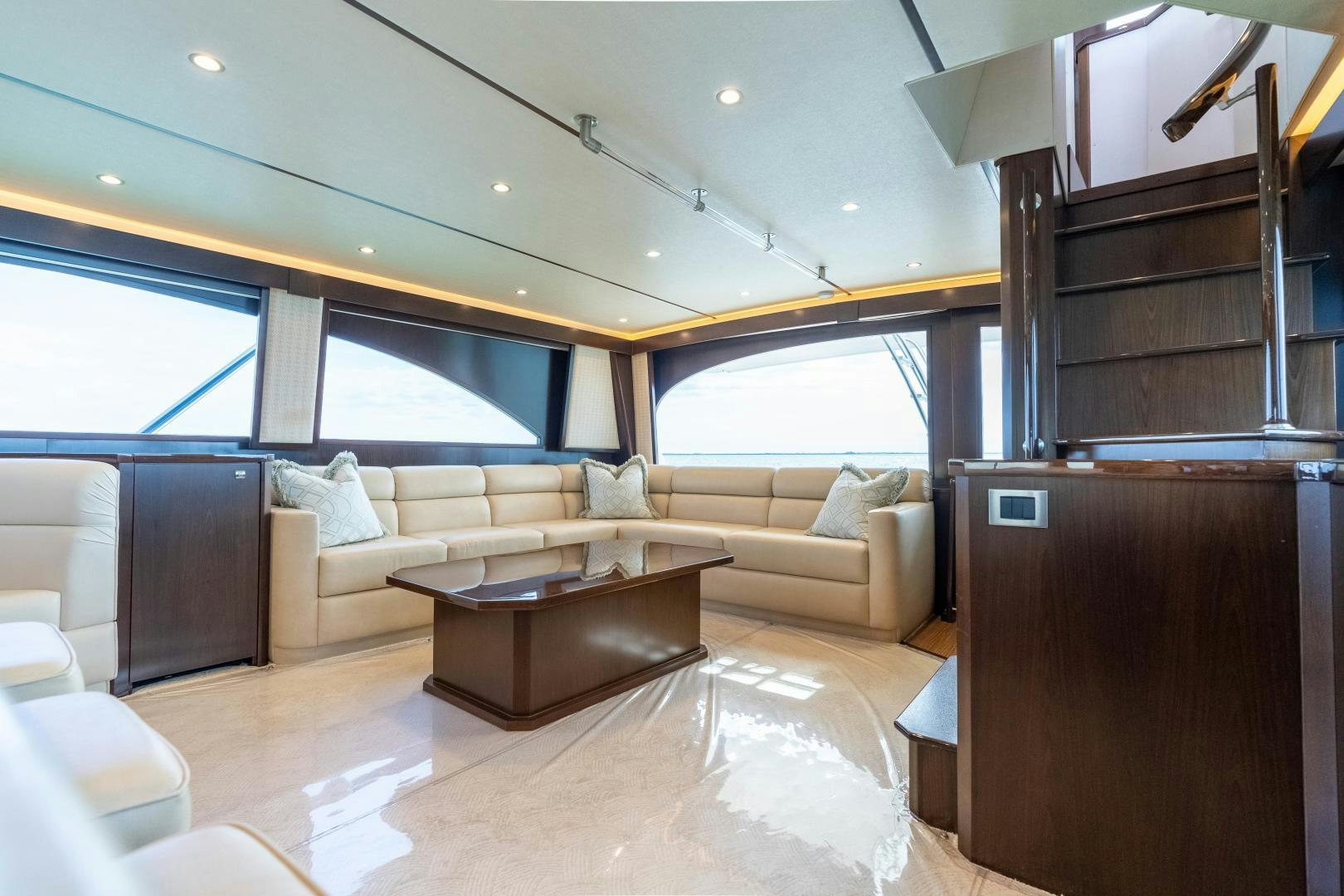 a living room with a large window aboard MER SEA SAKES Yacht for Sale