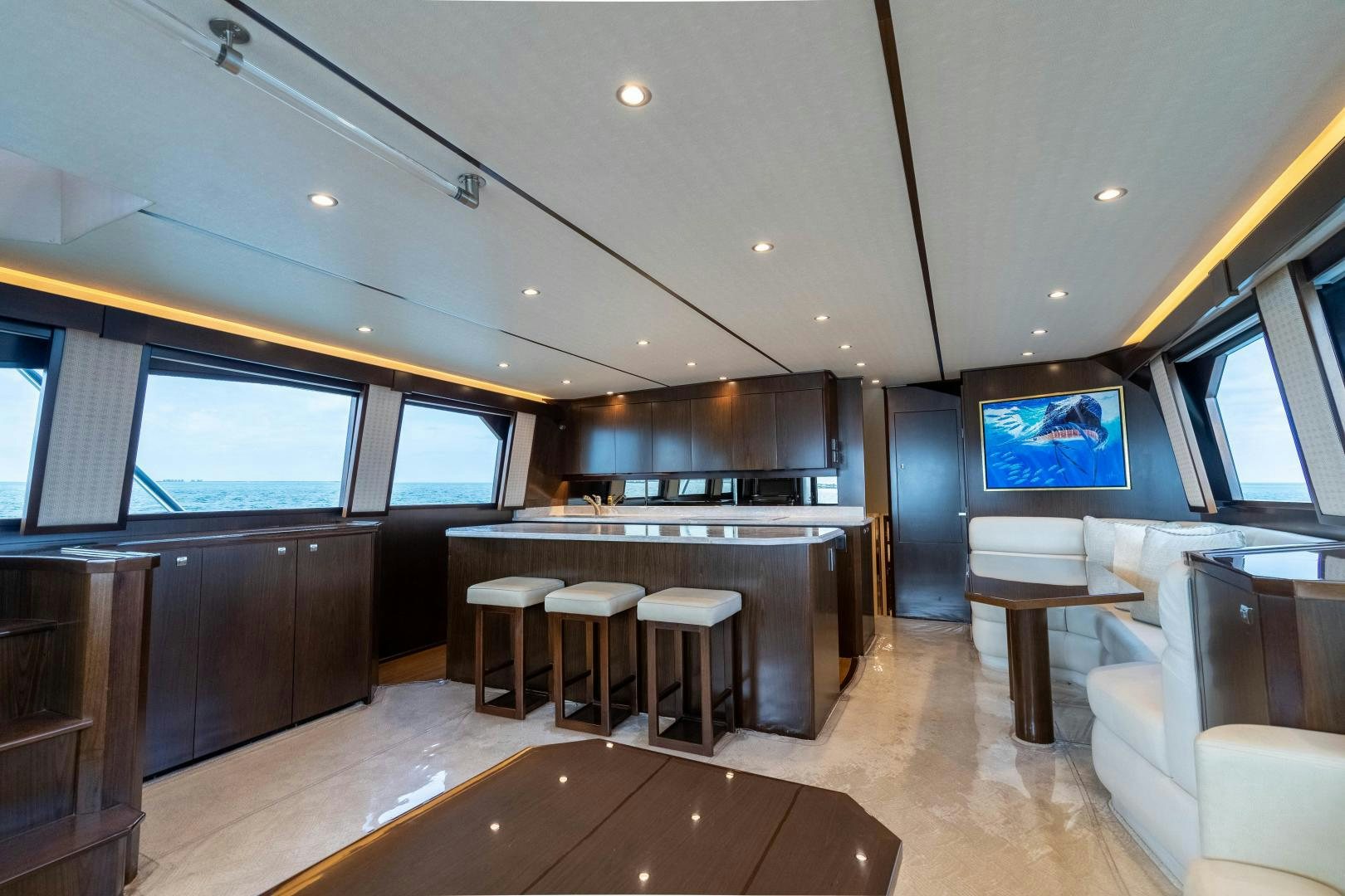 a large kitchen with a bar and bar area aboard MER SEA SAKES Yacht for Sale