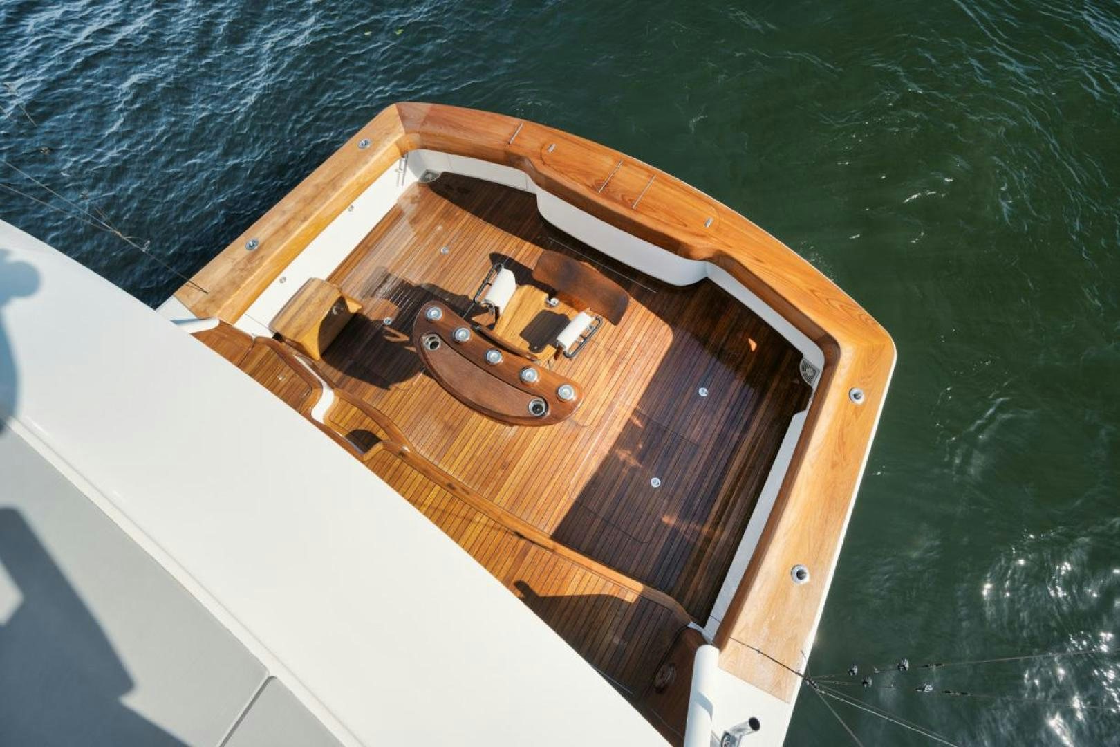 a wooden boat on a boat aboard MADNIC Yacht for Sale