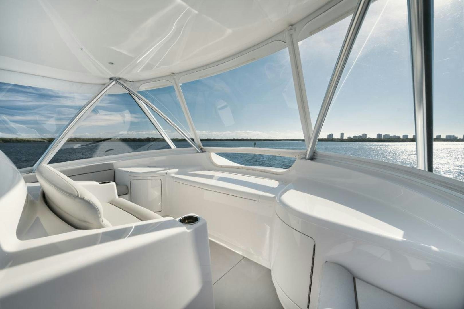 a boat with a large window aboard MADNIC Yacht for Sale