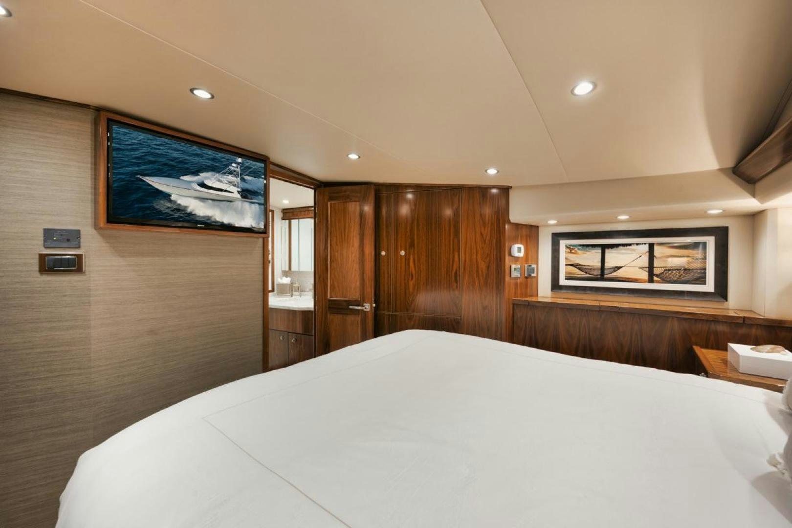 a bed in a room aboard MADNIC Yacht for Sale